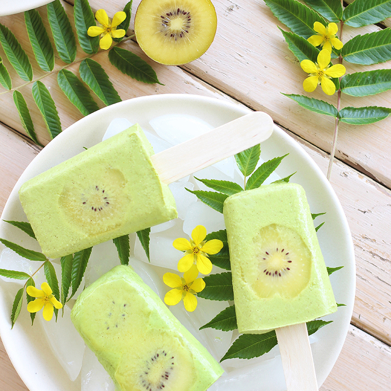 Golden Kiwi Piña Colada Popsicles // JustineCelina.com