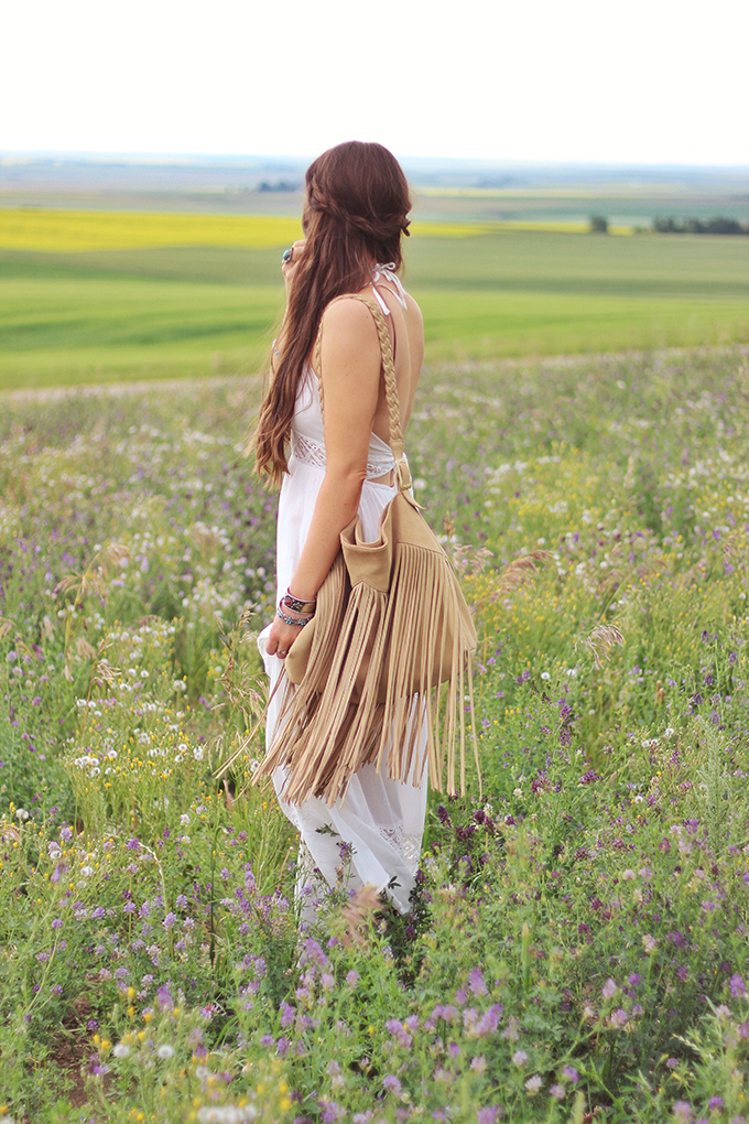 What to Wear to | The Calgary Stampede | Bohemian White Maxi Dress in a Field of Wildflowers // JustineCelina.com