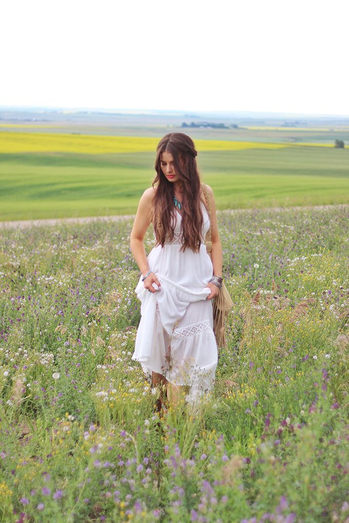 What to Wear to | The Calgary Stampede | Bohemian White Maxi Dress in a Field of Wildflowers // JustineCelina.com