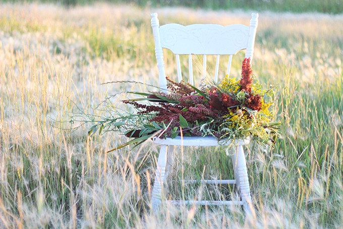 Foraged Prairie Wildflower Bouquet on a White Antique Chair in a Field | Calgary, Alberta, Canada // JustineCelina.com