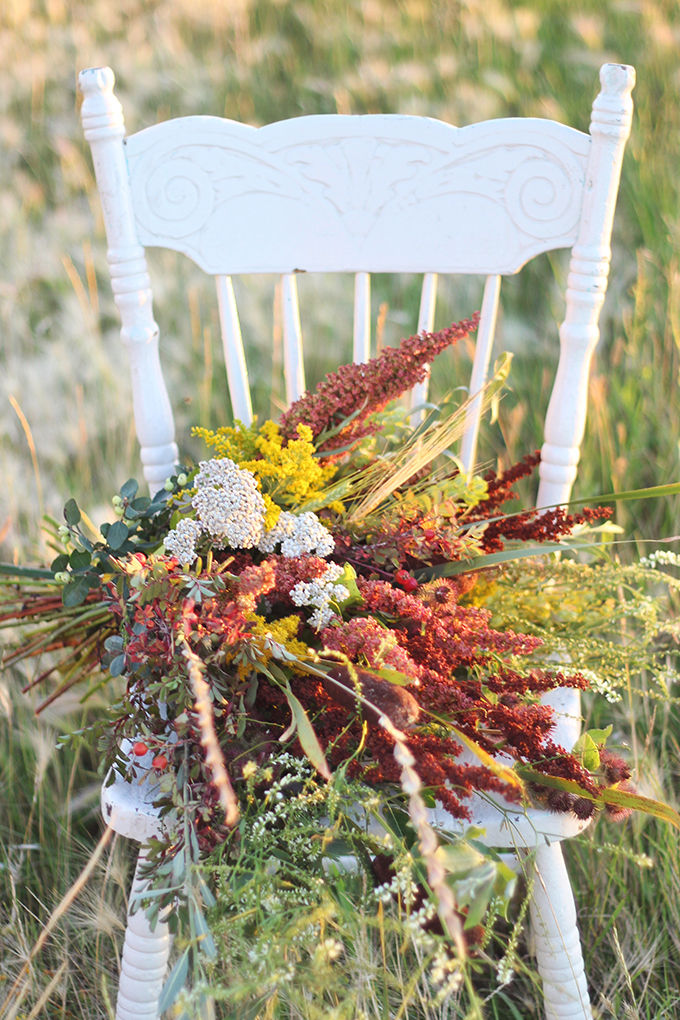 Foraged Prairie Wildflower Bouquet on a White Antique Chair in a Field | Calgary, Alberta, Canada // JustineCelina.com