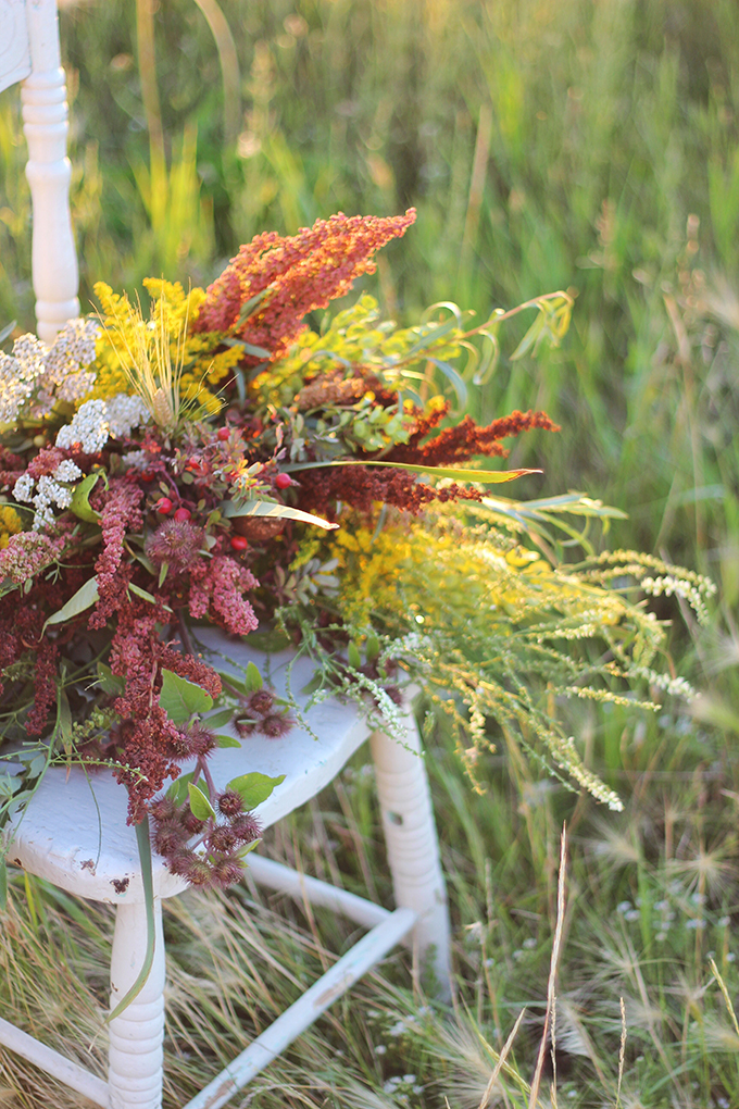 Foraged Prairie Wildflower Bouquet on a White Antique Chair in a Field | Calgary, Alberta, Canada // JustineCelina.com