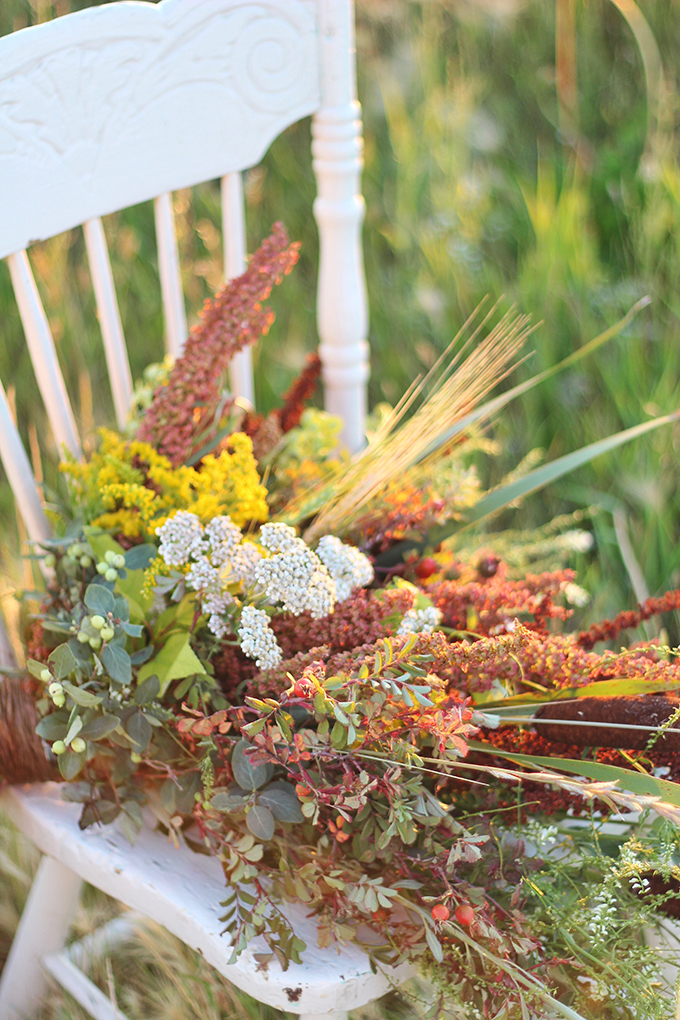 Foraged Prairie Wildflower Bouquet on a White Antique Chair in a Field | Calgary, Alberta, Canada // JustineCelina.com