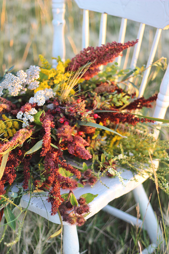 Foraged Prairie Wildflower Bouquet on a White Antique Chair in a Field | Calgary, Alberta, Canada // JustineCelina.com