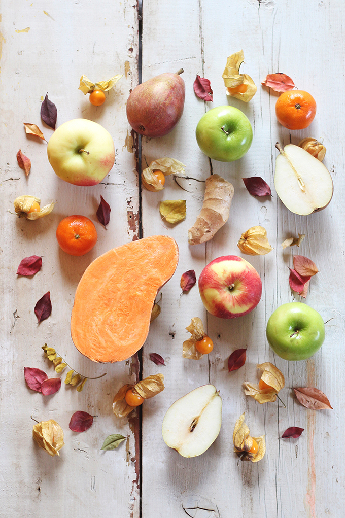 Autumn Energizer Juice made with seasonal autumn produce: apples, red pears, mandarin oranges, ginger, caped gooseberries // JustineCelina.com