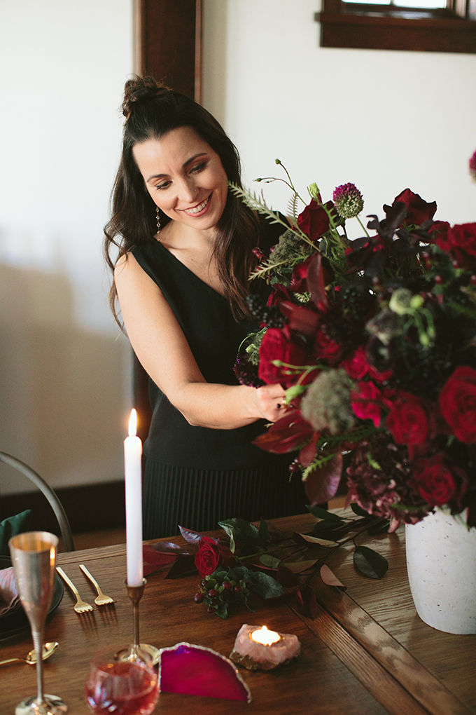 Luxe Holiday Floral Inspiration | Moody Winter Flower Arrangement with Black Magic Roses, Black Baccara Roses Gem and Lace Spray Garden Roses, Liqustrom, Hypericum, Allium, Lisianthus, Scabiosa, Chocolate Lace, Cotinus, Photina and Grevillea by Rebecca Dawn Design // JustineCelina.com