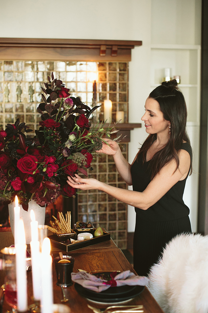 Luxe Holiday Floral Inspiration | Moody Winter Flower Arrangement with Black Magic Roses, Black Baccara Roses Gem and Lace Spray Garden Roses, Liqustrom, Hypericum, Allium, Lisianthus, Scabiosa, Chocolate Lace, Cotinus, Photina and Grevillea by Rebecca Dawn Design // JustineCelina.com