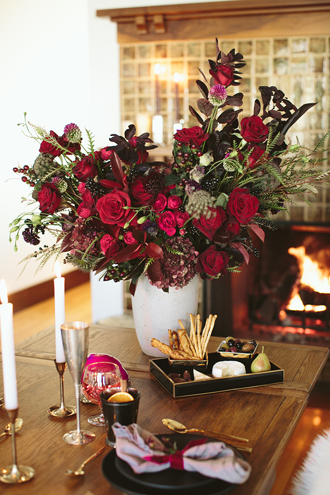 Luxe Holiday Floral Inspiration | Moody Winter Flower Arrangement with Black Magic Roses, Black Baccara Roses Gem and Lace Spray Garden Roses, Liqustrom, Hypericum, Allium, Lisianthus, Scabiosa, Chocolate Lace, Cotinus, Photina and Grevillea by Rebecca Dawn Design // JustineCelina.com