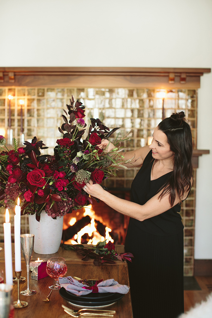 Luxe Holiday Floral Inspiration | Moody Winter Flower Arrangement with Black Magic Roses, Black Baccara Roses Gem and Lace Spray Garden Roses, Liqustrom, Hypericum, Allium, Lisianthus, Scabiosa, Chocolate Lace, Cotinus, Photina and Grevillea by Rebecca Dawn Design // JustineCelina.com