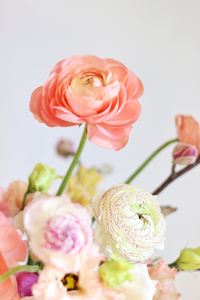 A Blushing Spring Arrangement with Coral Japanese Ranunculus | Spring Wedding Flower Ideas | Pantone Colour Trends Spring 2017 // JustineCelina.com