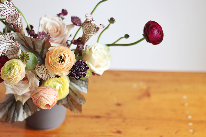  Bringing Autumn Flowers Into Your Home | A Moody, Autumn Arrangement including Ranunculus, Mother of Pearl Roses, Astrantia, Scabiosa, Saracena Lily, Poppy Pods and Angel Wings Begonia Leaves // JustineCelina.com + Rebecca Dawn Design 