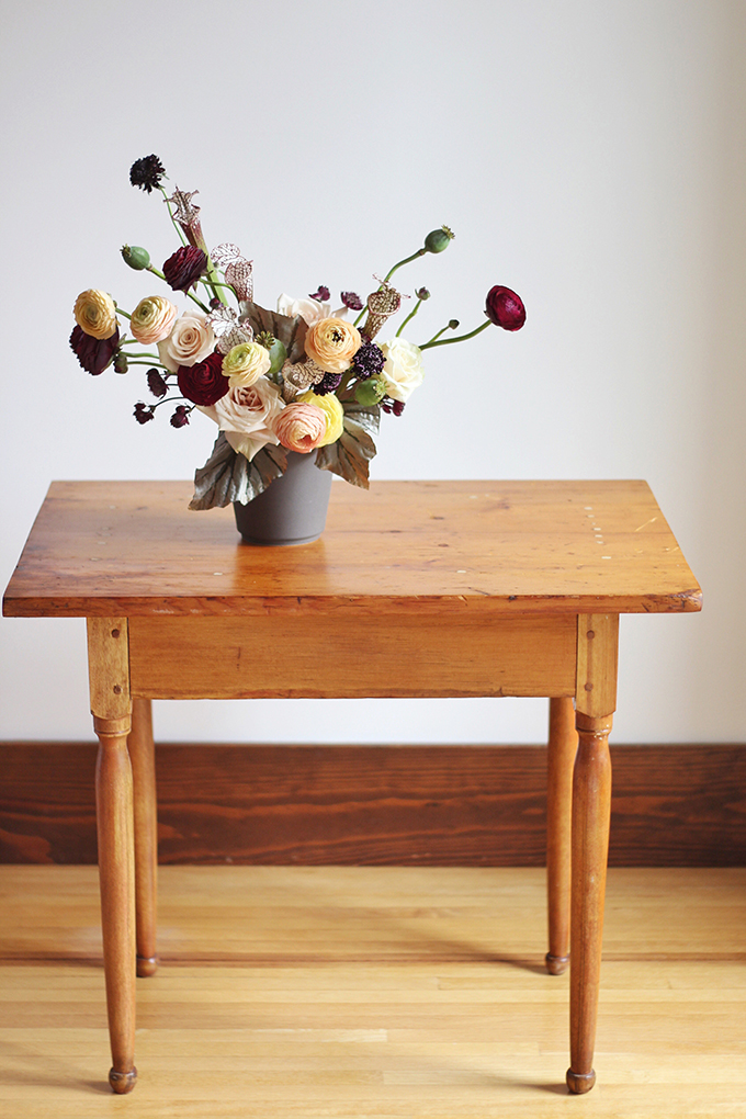  Bringing Autumn Flowers Into Your Home | A Moody, Autumn Arrangement including Ranunculus, Mother of Pearl Roses, Astrantia, Scabiosa, Saracena Lily, Poppy Pods and Angel Wings Begonia Leaves // JustineCelina.com + Rebecca Dawn Design 