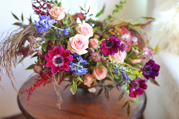 A PANTONE 2018 Ultra Violet Inspired Arrangement with Anemones, Spray Roses, Bella Donna, Dephinium, Astrantia, Astilbe, Sedum, Ruby Silk Grass, Nandina, Umbrella Fern and Knife blade Acacia // JustineCelina.com x Rebecca Dawn Design