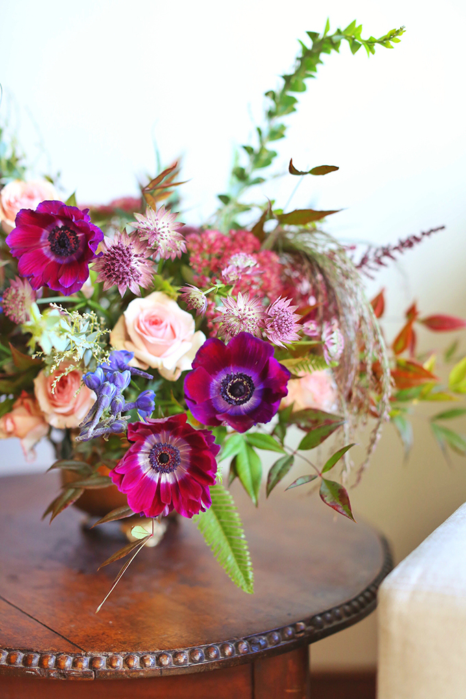 A PANTONE 2018 Ultra Violet Inspired Arrangement with Anemones, Spray Roses, Bella Donna, Dephinium, Astrantia, Astilbe, Sedum, Ruby Silk Grass, Nandina, Umbrella Fern and Knife blade Acacia // JustineCelina.com x Rebecca Dawn Design