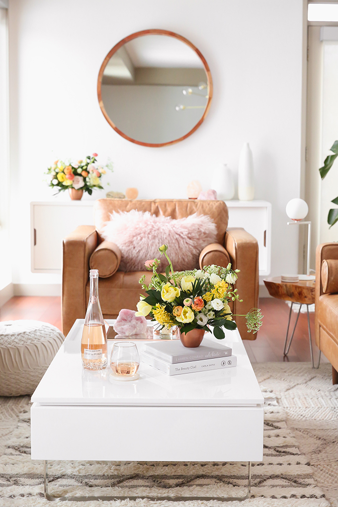 How to Unite a Space With Flowers | A Cheerful Spring Arrangement featuring Hyacinths, Double tulips, Ranunculus, Larkspur, Queen Anne’s Lace, Quicksand roses, Lisianthus, Camellia, Willow Eucalyptus and Podocarpus created by Rebecca Dawn Design // JustineCelina.com