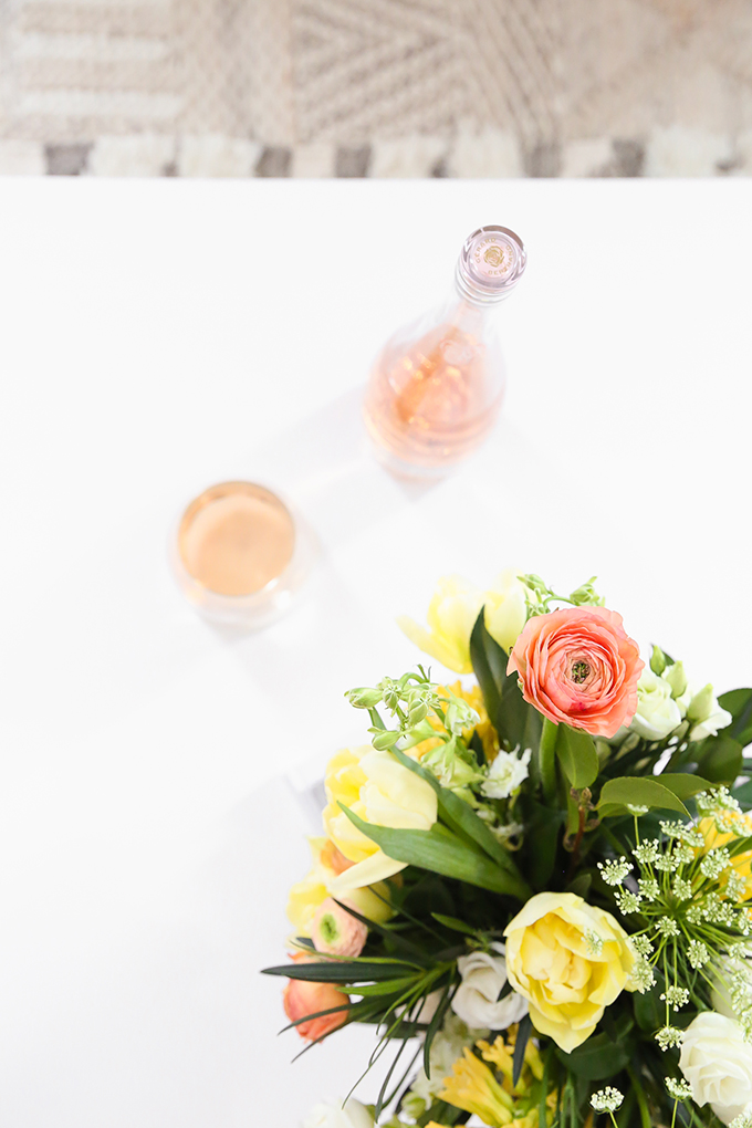 How to Unite a Space With Flowers | A Cheerful Spring Arrangement featuring Hyacinths, Double tulips, Ranunculus, Larkspur, Queen Anne’s Lace, Quicksand roses, Lisianthus, Camellia, Willow Eucalyptus and Podocarpus created by Rebecca Dawn Design // JustineCelina.com