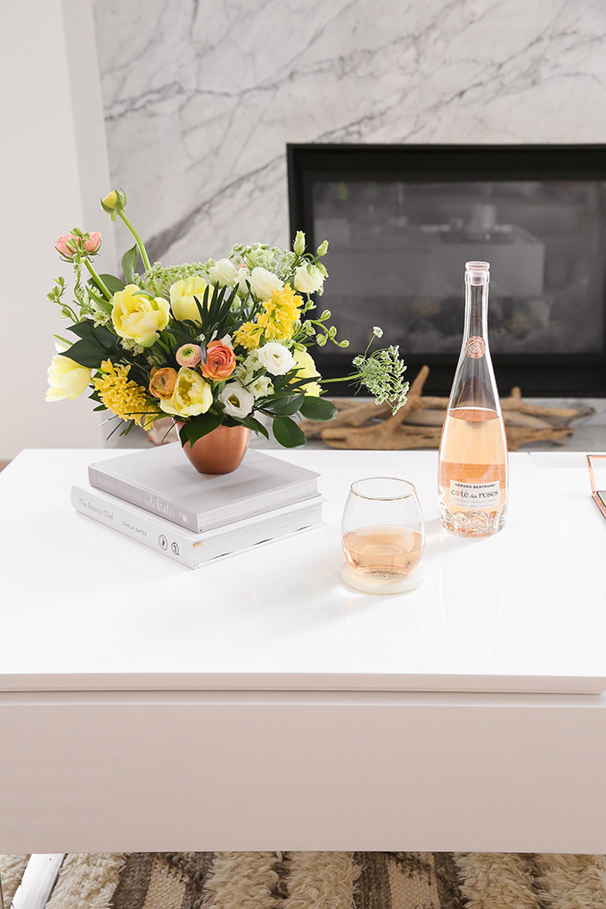 How to Unite a Space With Flowers | A Cheerful Spring Arrangement featuring Hyacinths, Double tulips, Ranunculus, Larkspur, Queen Anne’s Lace, Quicksand roses, Lisianthus, Camellia, Willow Eucalyptus and Podocarpus created by Rebecca Dawn Design // JustineCelina.com