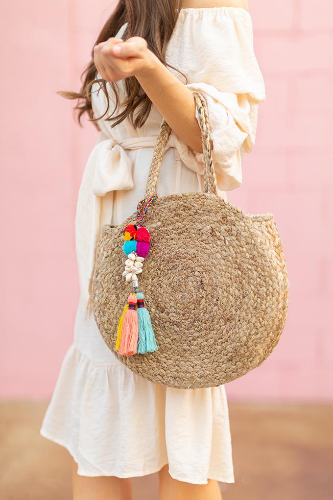 The Accessory Edit | Natural Material Bags | Zara Circular Straw Bag with Pom Poms and Tassels | How to Style Straw Bags | The Best Straw Bags 2018 // JustineCelina.com