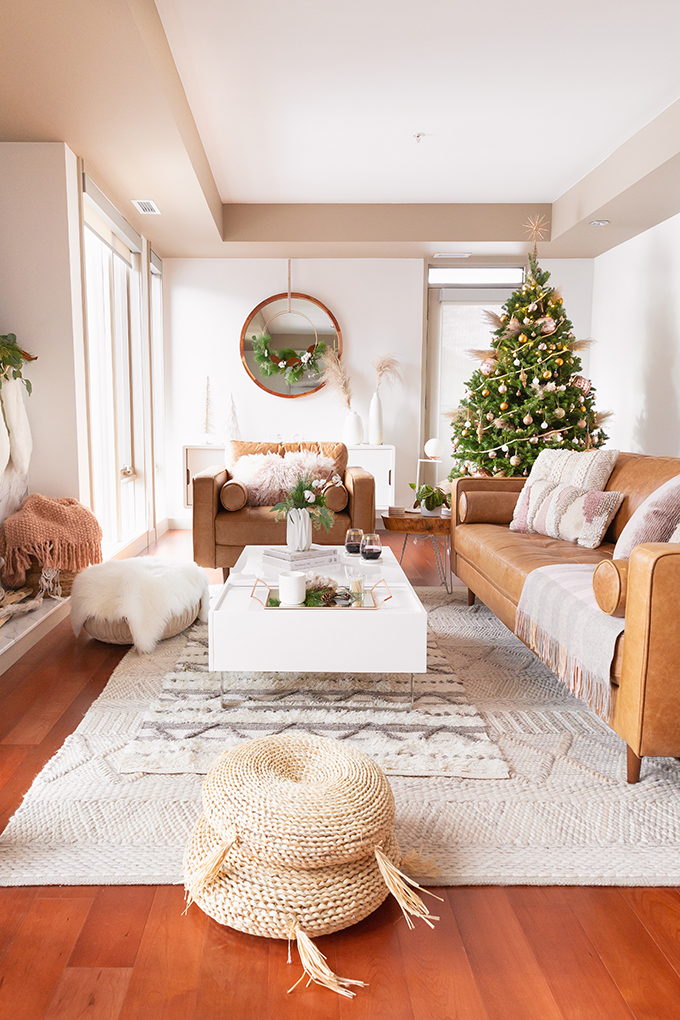 Apartment Friendly Modern Holiday Decor | Real Christmas Tree with Wood Garland, Metallic and Wood Ornaments and Pampas Grass | Premium Nova Scotia Balsam Fir Tree | Bohemian, Mid Century Modern Holiday Decor | Bohemian Holiday Home Tour 2018 | Caramel Mid Century Modern Leather Couches | Canadian Tire CANVAS Ornaments // JustineCelina.com