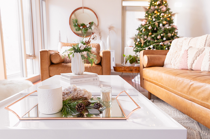 Apartment Friendly Modern Holiday Decor | Simple Holiday Coffee Table with Candles, Quartz, Fresh Greenery and Pinecones | Simple Holiday Arrangement on a Coffee Table with Greenery and Cotton Stems | Bohemian, Mid Century Modern Holiday Decor | Bohemian Holiday Home Tour 2018 | Canadian Tire CANVAS Ornaments // JustineCelina.com