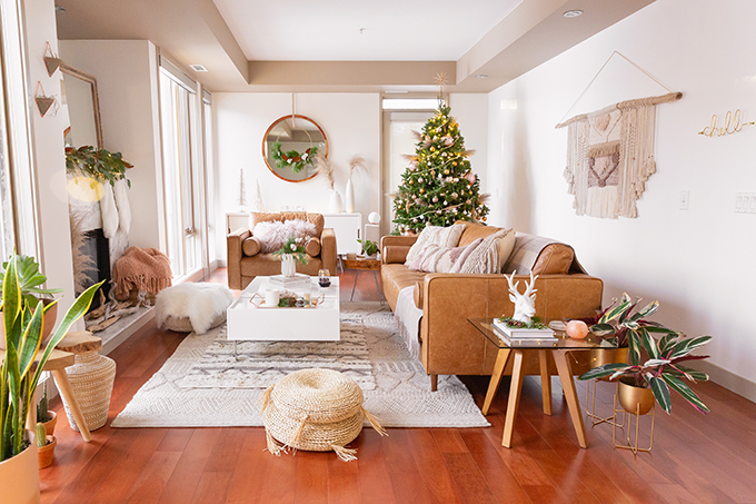 Apartment Friendly Modern Holiday Decor | Real Christmas Tree with Wood Garland, Metallic and Wood Ornaments and Pampas Grass | Premium Nova Scotia Balsam Fir Tree | Bohemian, Mid Century Modern Holiday Decor | Bohemian Holiday Home Tour 2018 | Caramel Mid Century Modern Leather Couches | Canadian Tire CANVAS Ornaments // JustineCelina.com 