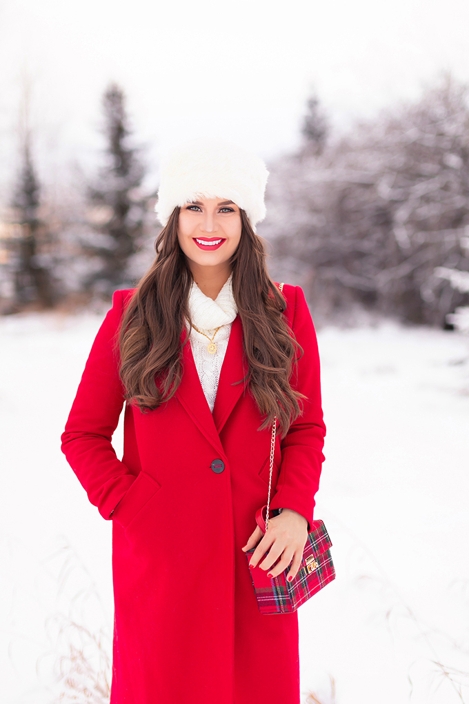 2018 Rewind + 2019 Goals | Calgary Lifestyle Blogger | Festive, Casual Holiday Outfit with a Red Coat | Brunette Girl Smiling in a Red Coat and a Faux Fur Headband | Lancome Matte Shaker in Red-y in 5 // JustineCelina.com 