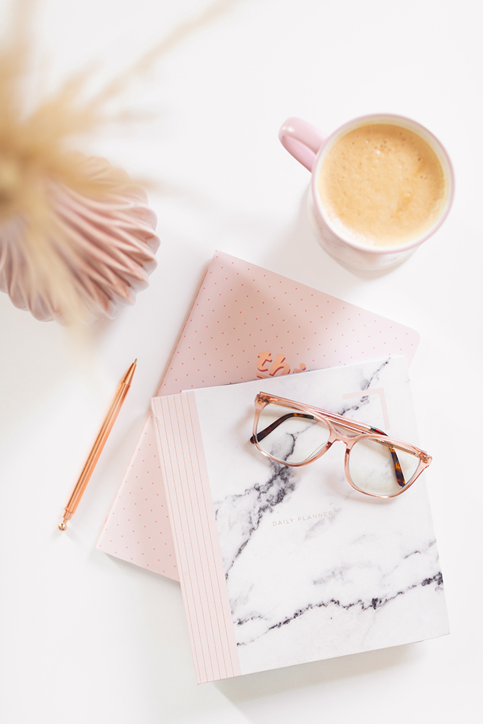 2018 Review + 2019 Goals | Calgary Lifestyle Blogger | 2019 Planning and Goal Setting | Entrepreneur Working from Home | HomeSense Fringe This Girl Can 2019 Agenda | STIL Classics Daily 6 Month Planner |  Nespresso Coffee on a White Coffee Table | 2019 Motivational Goals Flatlay | Bonlook Lauren Blue Light Blocking Glasses In Peach // JustineCelina.com