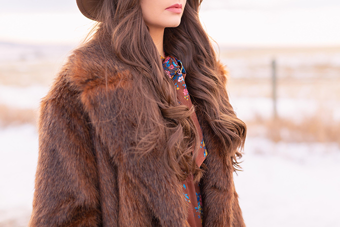 Pre Spring 2019 Trend Guide Bohemian Rhapsody: How to Style Midi Dresses for Transitional Spring Weather | Brunette Girl Standing in a Country Field at Sunrise Wearing a Brown Floral Dress, Brown Wide Brim Hat and a Mustard Cross Body Bag | Bohemian Winter Style Ideas | Pantone Spring Summer 2019 Fashion Ideas | Calgary, Alberta, Canada Fashion & Lifestyle Blogger // JustineCelina.com