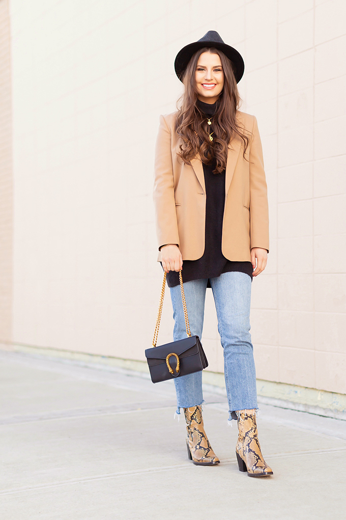 Spring 2019 Trend Guide | Modern Western: How to Style Snakeskin Ankle Boots for Transitional Winter to Spring Weather | Western Snakeskin Ankle Boots Styled With Cropped, Stem Hem Jeans, An Oversized Black Sweater, A Tan Boyfriend Blazer, a Black, Wide Brim Hat and a Gucci Dionysus Small Shoulder Bag | Bohemian Spring Transitional Style Ideas | How to Wear the Western Trend for 2019 | Calgary, Alberta, Canada Fashion & Lifestyle Blogger // JustineCelina.com