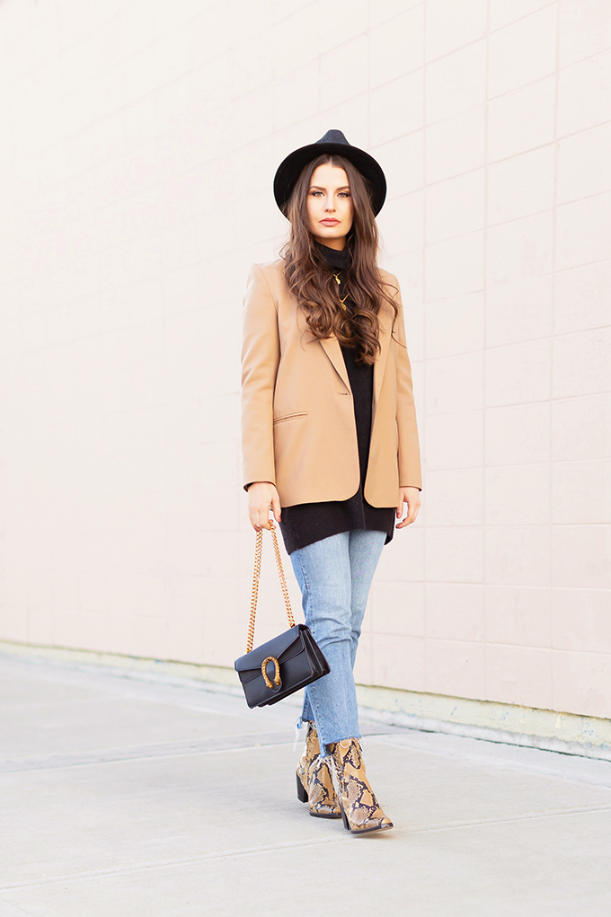 Spring 2019 Trend Guide | Modern Western: How to Style Snakeskin Ankle Boots for Transitional Winter to Spring Weather | Western Snakeskin Ankle Boots Styled With Cropped, Stem Hem Jeans, An Oversized Black Sweater, A Tan Boyfriend Blazer, a Black, Wide Brim Hat and a Gucci Dionysus Small Shoulder Bag | Bohemian Spring Transitional Style Ideas | How to Wear the Western Trend for 2019 | Calgary, Alberta, Canada Fashion & Lifestyle Blogger // JustineCelina.com