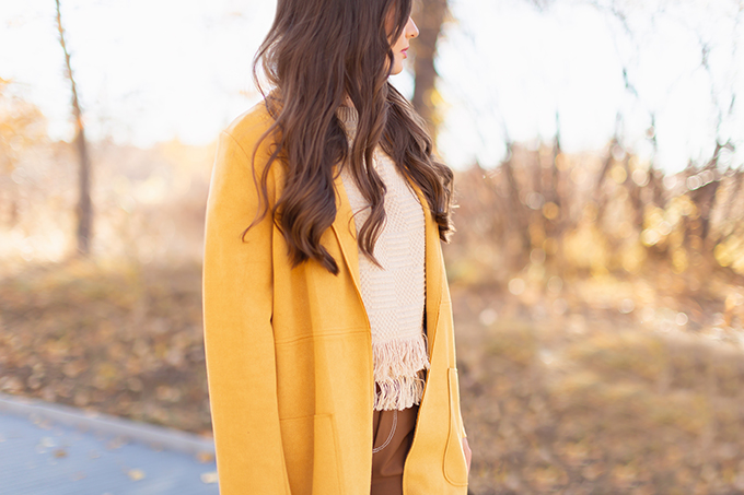 WORK WEAR | SPRING 2019 TRENDS AT THE OFFICE | How to Style Culottes for the Office | Brown 70’s Style Culottes with a Mustard Faux Suede Jacket, Knit Fringe Hem Top, Natural Material Rattan Woven Box Bag and Leopard Print D’Orsay Heels | Spring 2019 Trends | Office Appropriate Spring Outfit Ideas // JustineCelina.com