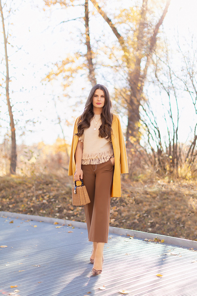 Autumn 2018 Lookbook | How to Style Culottes for the Office | Brown 70’s Style Culottes with Mustard Jacket, Fringe Top, Woven Bag and Leopard Heels | Autumn 2018 Trends | JustineCelina.com