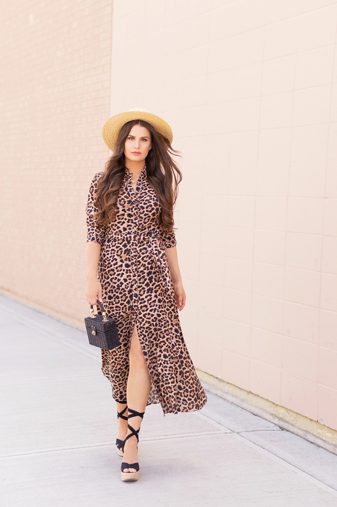 SPRING/SUMMER 2019 LOOKBOOK | Animal Instincts: How to Style a Button-Down Leopard Print Maxi Dress for Spring | Leopard Print Outfit Ideas Spring 2019 | Spring/Summer Vacation Outfit Ideas | Brunette woman wearing a Button-Down Leopard Print Maxi Dress styled with a straw hat, black lace up espadrilles and a black raffia minaudière bag | Top Spring/Summer 2019 Trends and how to wear them | Calgary Fashion & Creative Lifestyle Blogger