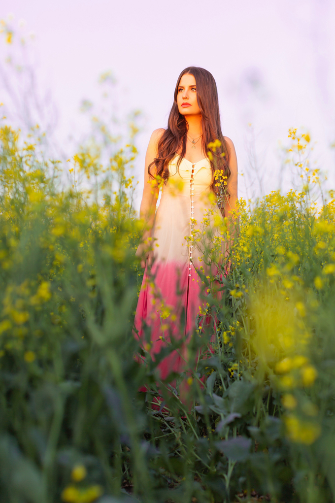 Another Trip Around The Sun | Brunette woman in a field of canola wearing a button-front ombre maxi dress at sunset celebrating her birthday | Bohemian Summer Outfit Ideas | Leo Season | Calgary, Alberta, Canada Lifestyle and Fashion Blogger, Justine Celina Maguire | JustineCelina Birthday | JustineCelina.com