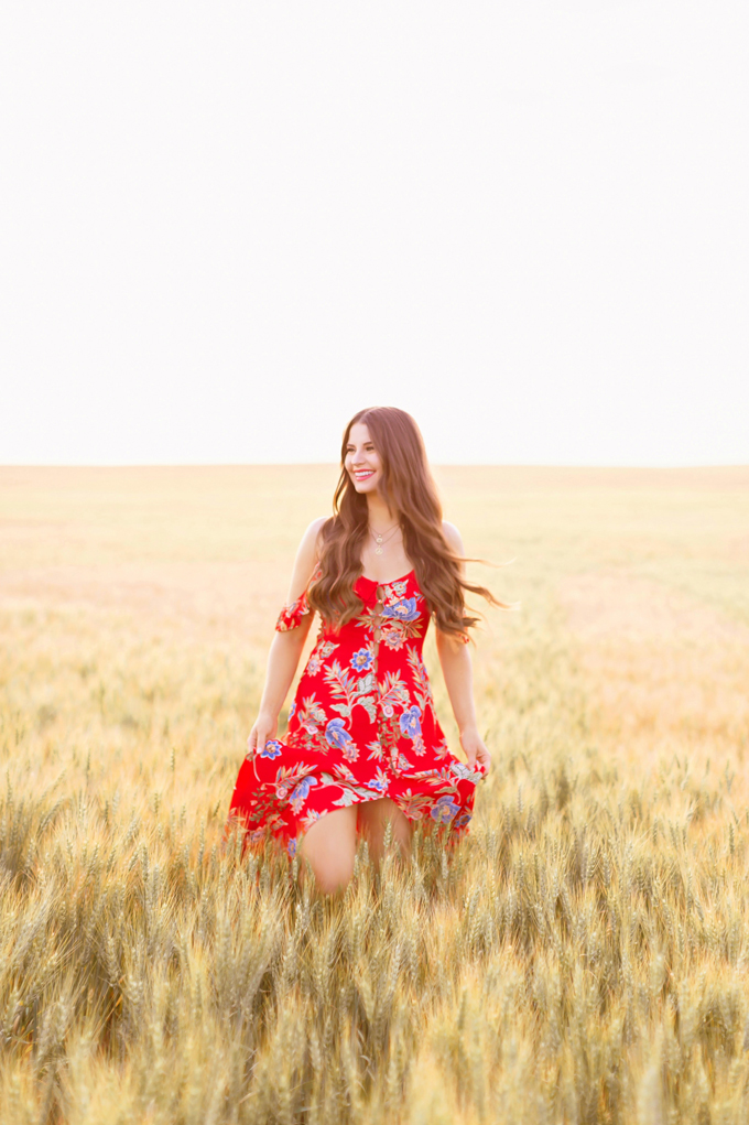 LATE SUMMER 2019 LOOKBOOK | Crimson and Clover: How to Style Maxi Dresses for Summer / Autumn | Red Maxi Dress Outfit Ideas | Bohemians Transitional Outfit Ideas | Brunette woman wearing a floral printed red maxi dress with nude espadrilles in a wheat field | Summer 2019 Trends | Canadian wheat field in Wheatland County, Alberta at Sunset | A Canadian Field of Wheat at Golden Hour | Calgary, Alberta, Canada Lifestyle and Fashion Blogger, Justine Celina Maguire | JustineCelina.com