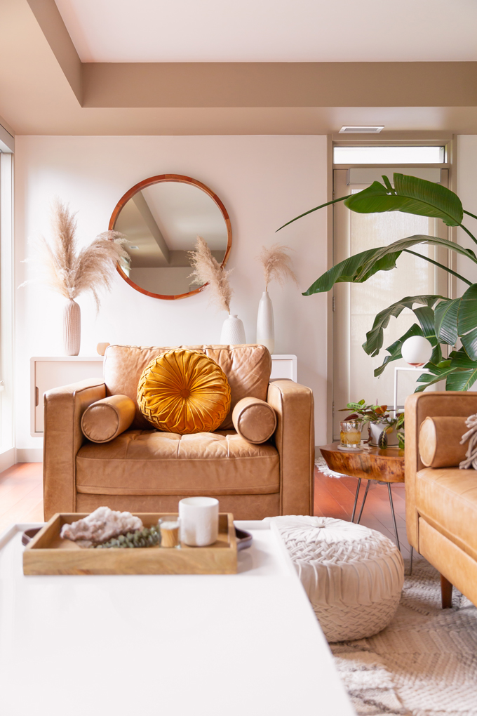 How to Transition Your Decor Into Fall | Easy and inexpensive fall decorating ideas | JustineCelina’s Inner City Calgary bohemian, mid-century modern apartment | A Bohemian, Mid-Century Modern Living Room featuring Urban Outfitters Round Pintuck Pillow in Mustard | Fall Decor 2019 Trends | Bohemian, Mid Century Modern Fall Decor | Pantone Fall Winter 2019 / 2020 Interior Design Trends | Fall Decorating DIY | Calgary Lifestyle, Interior Design and Home Decor Blogger // JustineCelina.com