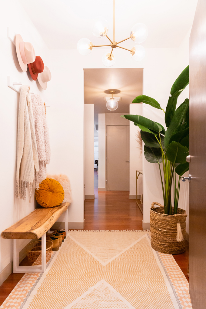 Space Refresh: Entrance Way Reveal in Partnership with Mobilia Canada | A Bohemian, Mid-Century Modern Apartment Entrance Way | Justine Celina Maguire’s Home | 2019 Home Decor Trends | Behr Ultra Pure White | Mobilia Aly Velji Modern India Collection Review | Bohemian, Mid Century Modern Decor | Faux Bird of Paradise Plant | Calgary Lifestyle, Interior Design and Home Decor Blogger // JustineCelina.com