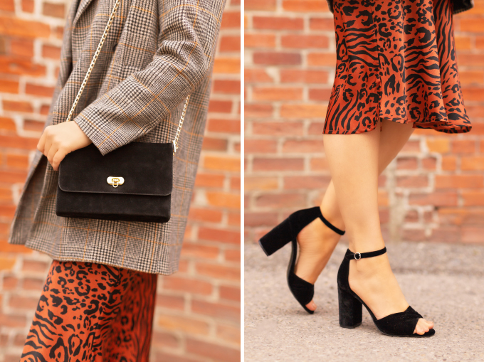 Autumn 2019 Lookbook: Cheetah Chic | Top Fall / Winter 2019 Trends | Top Autumn 2019 Trends and How to Wear Them | Brunette woman wearing a burnt orange cheetah print satin midi skirt, black turtleneck, oversized plaid blazer, black velvet sandals and a vintage suede bag | Chic Fall / Winter 2019 Evening Outfits | How to Style Cheetah Print | How to Style Boyfriend Blazers | How to Mix Prints | Top Calgary Fashion & Creative Lifestyle Blogger // JustineCelina.com