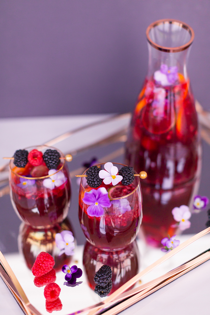 Violette Noir Berry Sangria | The Best Berry Sangria Recipe | Pinot Noir Sangria | Chambord Sangria Recipe | Red Sangria with Crème de Violette | Sophisticated Red Wine Sangria | The Best Berry Sangria for the holidays | Holiday Red Wine Sangria | Winter Berry Sangria Recipe | San Pellegrino Sangria | Black Raspberry Liqueur Sangria | Raspberry Sangria | Blackberry Sangria | Healthy No Added Sugar Sangria // JustineCelina.com