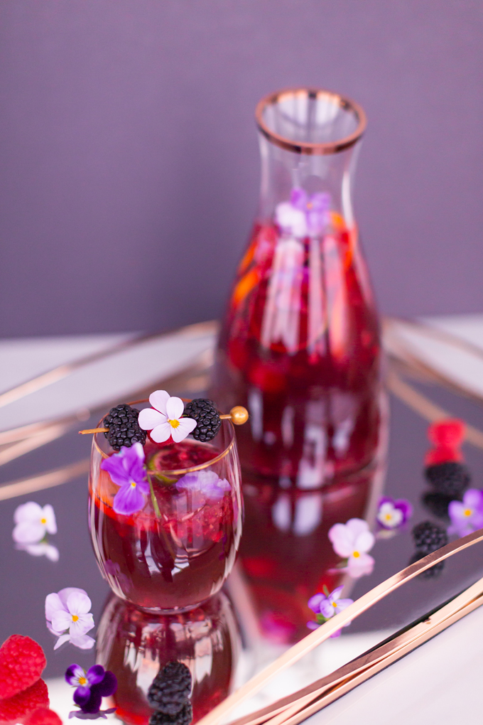 Violette Noir Berry Sangria | The Best Berry Sangria Recipe | Pinot Noir Sangria | Chambord Sangria Recipe | Red Sangria with Crème de Violette | Sophisticated Red Wine Sangria | The Best Berry Sangria for the holidays | Holiday Red Wine Sangria | Winter Berry Sangria Recipe | San Pellegrino Sangria | Black Raspberry Liqueur Sangria | Raspberry Sangria | Blackberry Sangria | Healthy No Added Sugar Sangria // JustineCelina.com