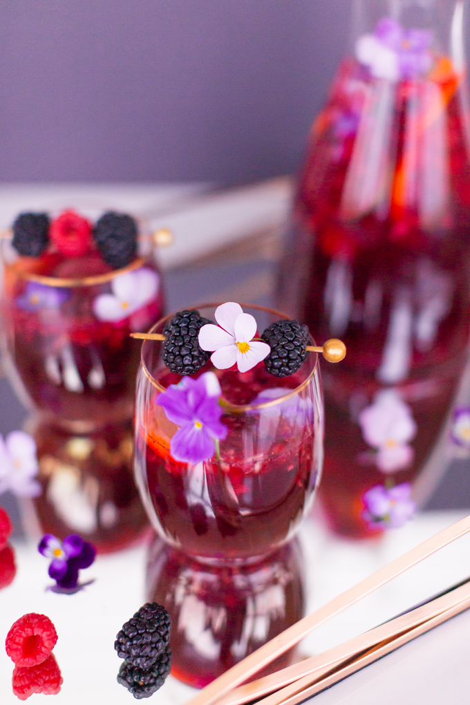 Violette Noir Berry Sangria | The Best Berry Sangria Recipe | Pinot Noir Sangria | Chambord Sangria Recipe | Red Sangria with Crème de Violette | Sophisticated Red Wine Sangria | The Best Berry Sangria for the holidays | Holiday Red Wine Sangria | Winter Berry Sangria Recipe | San Pellegrino Sangria | Black Raspberry Liqueur Sangria | Raspberry Sangria | Blackberry Sangria | Healthy No Added Sugar Sangria // JustineCelina.com