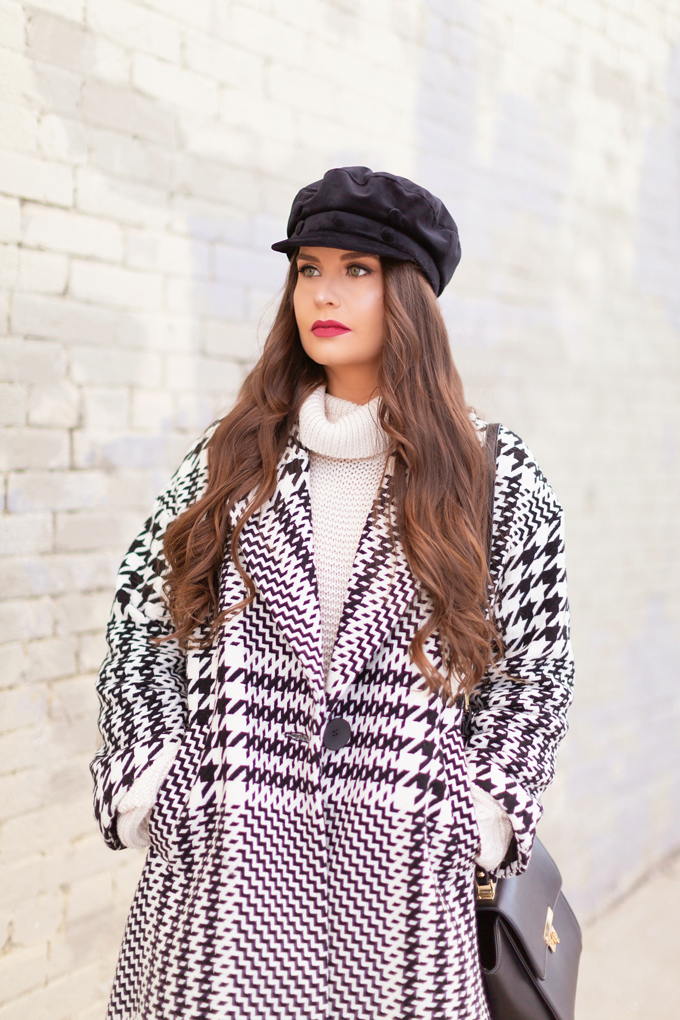 Autumn / Winter 2019 Lookbook: Houndstooth Chic | Top Fall / Winter 2019 / 2020 Trends | Top Winter 2019 / 2020 Trends and How to Wear Them | Brunette woman wearing a Zara Oversized Houndstooth Coat, Black Round Sunglasses, a Velvet Baker Boy Hat, a Chunky Cream Sweater, Black Faux Leather Leggings, and TopShop Leather Asymmetric Ankle Booth | How to Style a Houndstooth for 2020 | How to Wear Houndstooth | Chic Winter Fashion Ideas | Top Calgary Fashion Blogger // JustineCelina.com