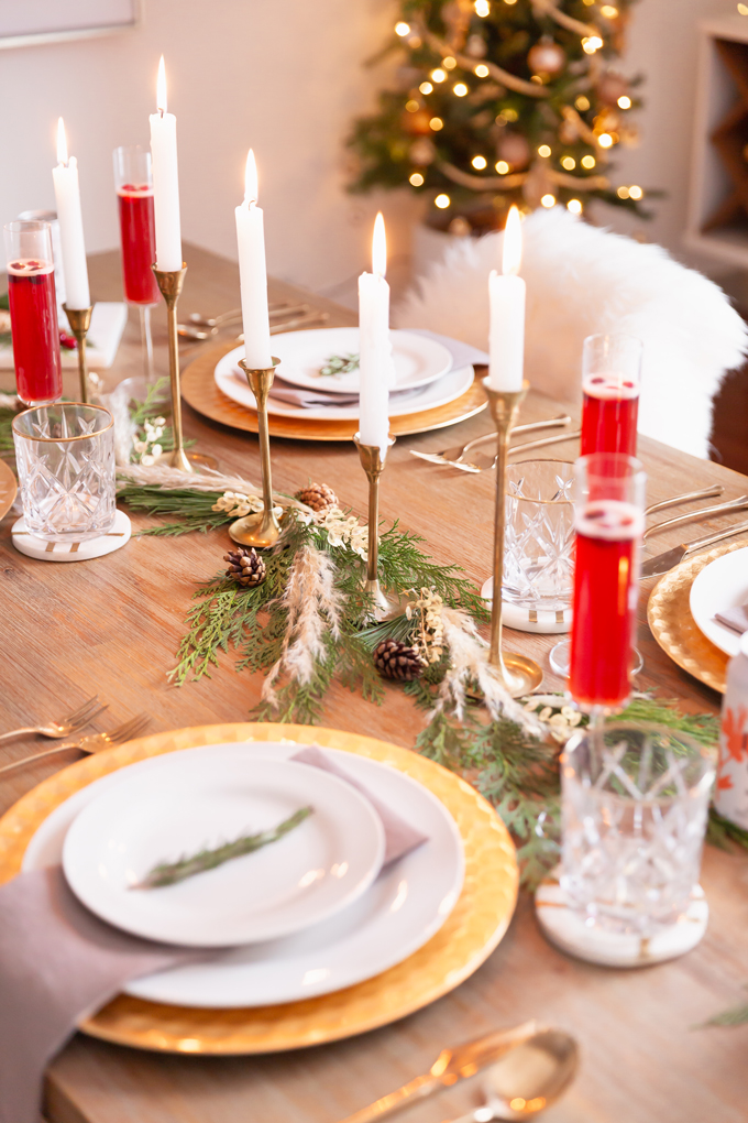 JustineCelina December 2019 Soundtrack + Bonus 2019 Soundtrack | Easy Holiday Entertaining Ideas | Chill Winter Playlist | Chill Holiday Playlist | Relaxing Winter Playlist | Music for Entertaining Holiday Cocktail Party | Easy Christmas Party Ideas | Simple Mid Century Modern Holiday Dinner Party | JustineCelina’s Mid Century Modern Bohemian Dining Room | Simple Festive Tablescape with Winter Greenery, Pampas Grass, Candles and Champagne | Calgary Lifestyle Blogger // JustineCelina.com