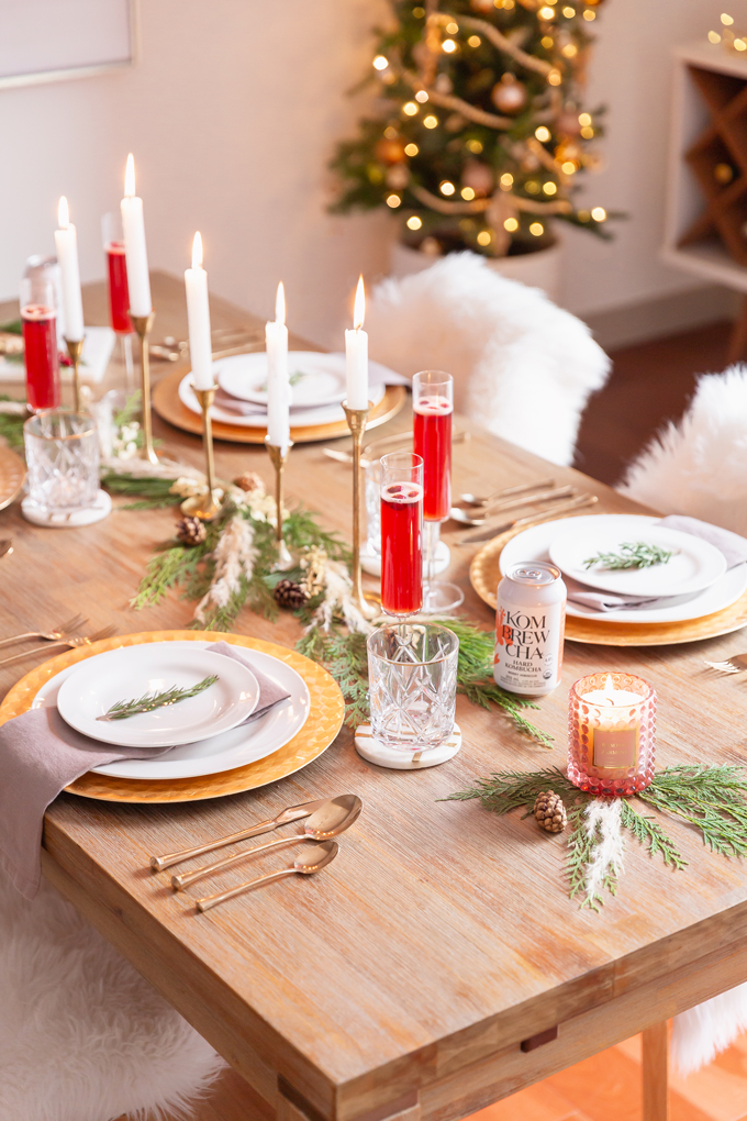 Easy Holiday Entertaining Ideas | Holiday Entertaining at Home | Stress Free Entertaining Tips | Holiday Cocktail Party | Easy Christmas Party Ideas | Simple Mid Century Modern Holiday Dinner Party | JustineCelina’s Mid Century Modern Bohemian Dining Room & Bar | Simple Festive Tablescape with Winter Greenery, Pampas Grass, Candles and Berry Hibiscus Kombrewcha | Kombrewcha available in Alberta | Kombrewca Review | Calgary Home Decor & Entertaining Blogger // JustineCelina.com