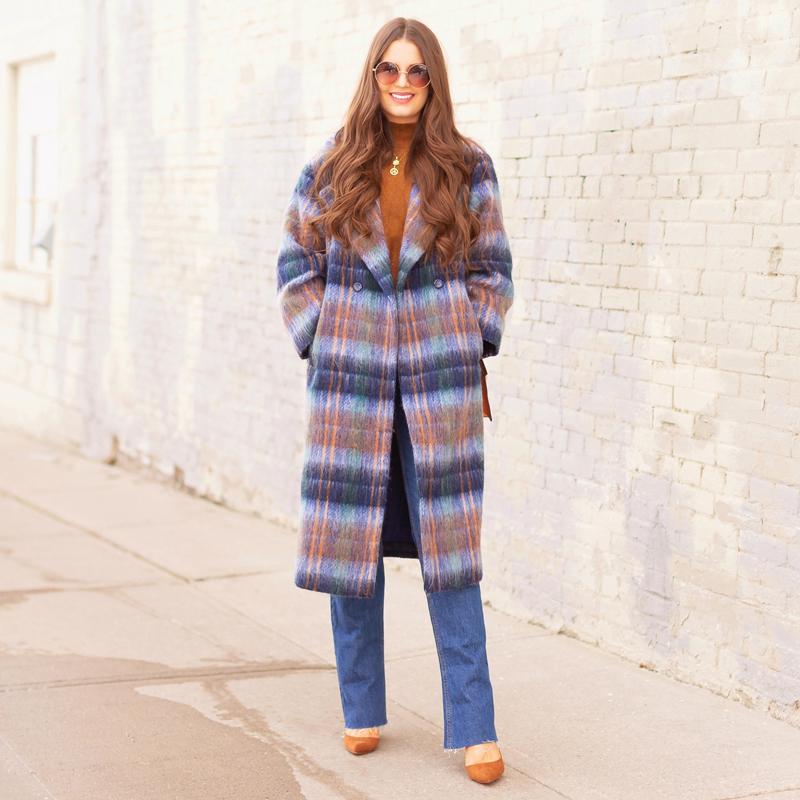 Colour Crush: Classic Blue | Brunette woman wearing a Classic Blue UO Oversized Plaid Wool Overcoat, Zara Straight Leg Blue Jeans, Mango Cognac Asymmetric Stiletto Shoes, H&M Brown Knit Turtleneck Sweater, TopShop Croc Embossed Crossbody Bag and Brown Circular Sunglasses in an urban Setting | How to Wear Pantone’s 2020 Color of the Year, Classic Blue | Pantone Color of The Year 2020 Fashion | Transitional Winter to Spring Fashion for Canadians | Calgary Fashion Blogger // JustineCelina.com