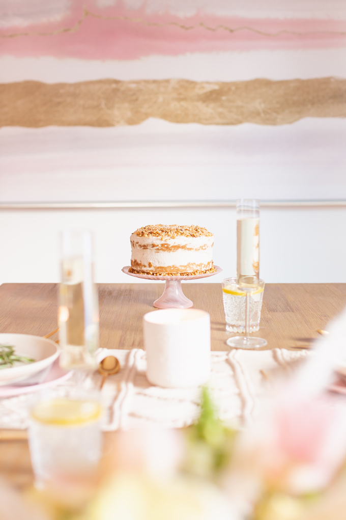 A Simple Easter Dinner for Two | JustineCelina’s Mid Century Modern Bohemian Dining Room Table Set for Easter | Easter Table Setting with a Vegan, Gluten and Oil Free Carrot Cake, Pastel Dinnerware, Champagne Flutes, Lemon Water, Gold Flatware, a Candle and Macrame Table Runner | Easter 2020 | Easter Entertaining at Home | Healthy Easter Carrot Cake | Easy Easter Decor Ideas | Mid Century Modern Easter Decor | Easy Easter Table Settings | Calgary Lifestyle and Decor Blogger // JustineCelina.com