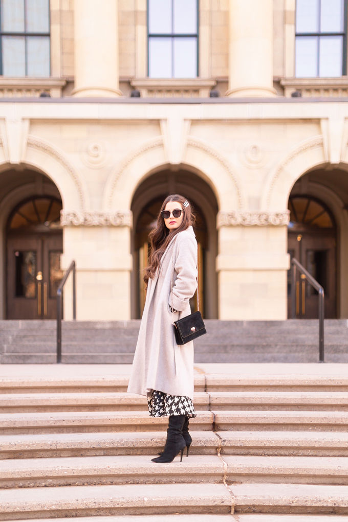 WINTER / SPRING 2020 LOOKBOOK | Graphic Glam | Brunette woman wearing an H&M Houndstooth-patterned Dress With Stand Up Collar, Black Suede Slouchy Pointed Toe Boots, ASOS Longline Faux Fur Trench, Vintage Black Suede Crossbody Bag, Pearl Hair Clips and Nordstrom B.P. Cat Eye Sunglasses | Top Transitional Winter to Spring 2020 Trends | Canadian Winter / Spring Lookbook | How to Wear Spring 2020’s Mini Dress | Transitional Winter to Spring Fashion for Canadians // JustineCelina.com