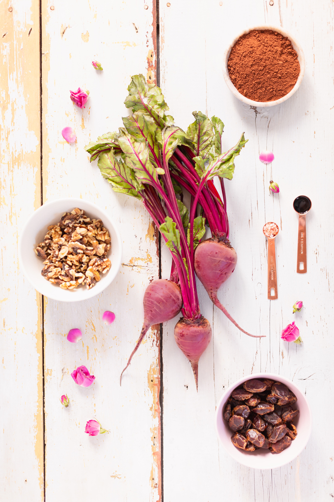 Raw Red Velvet Vegan Brownies | The Best No Bake Vegan Brownies | Healthy Vegan Brownies | Vegan Brownies With Dates | Raw Vegan Brownie Ingredients: Organic Beets, Cocoa Powder, Walnuts, Vanilla Extract, Himalayan Pink Salt and Medjool dates on a White Washed Wood Backdrop  | Calgary Plant Based Lifestyle Blogger // JustineCelina.com