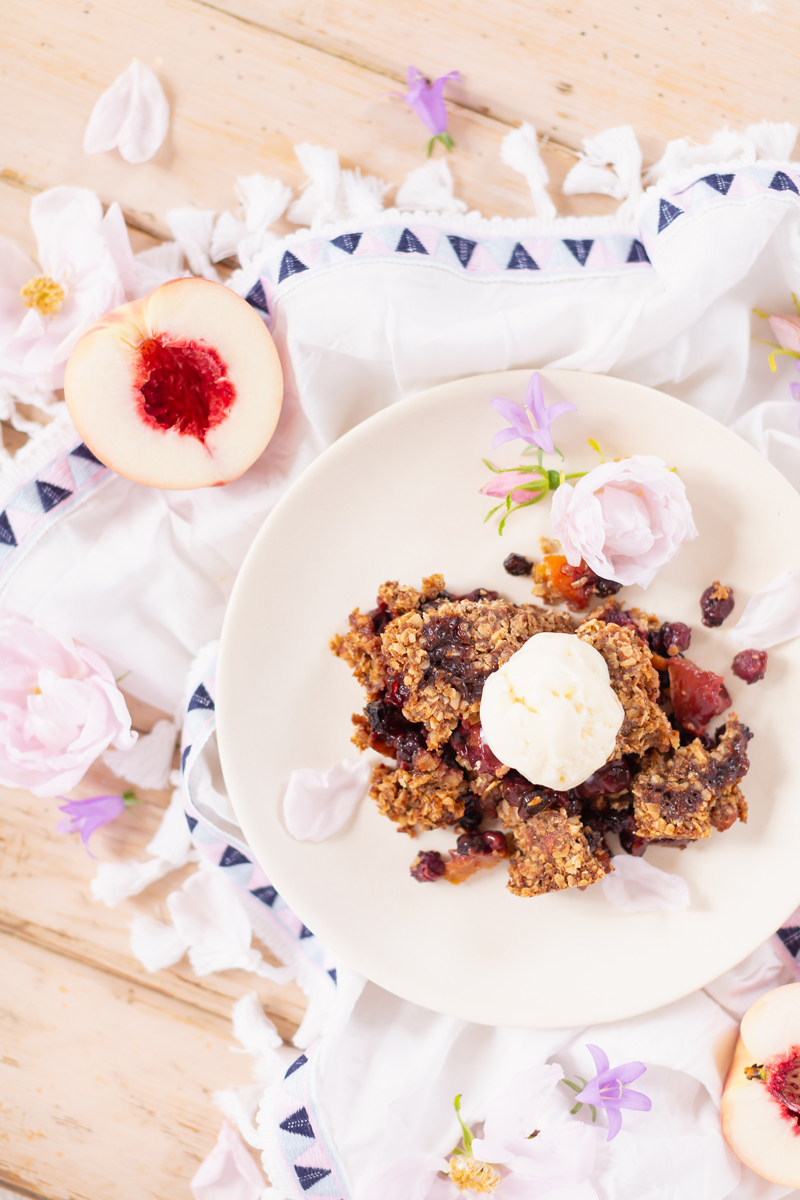 Vegan Gingered Saskatoon Peach Crumble | 4 Healthy Saskatoon Berry Recipes to Try This Summer + Where to Pick Saskatoons in Alberta | Vegan Saskatoon Berry Recipes | Easy Saskatoon Berry Crisp Recipe | Serviceberry Recipes | Dairy Free, Gluten Free and Refined Sugar Saskatoon Recipes | Vegan Saskatoon Crisp | What flavors go well with Saskatoons | Easy Prairies Saskatoon Berry Crumble | Saskatoon Berry Recipes Crisp | Calgary Lifestyle and Plant Based Food Blogger // JustineCelina.com 