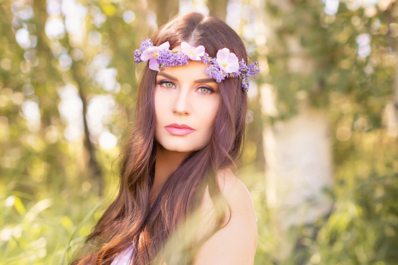 Summer 2020 Lookbook | Boho Summer 2020 Outfit Ideas | Bohemian Fashion | Flower Crown Made of Purple Alfalfa and Pink Wild Roses | Flower Crown Made of Alberta Wildflowers | How to Make a Flower Crown from Wildflowers | Summer 2020 Trends Brunette woman with green eyes wearing a Purple and Pink Flower Crown in a Sunny Woodland | Free Spirit Fashion Blog | Flowerchild Flower Crown | Real Flower Crown | Calgary Alberta Fashion Blogger // JustineCelina.com